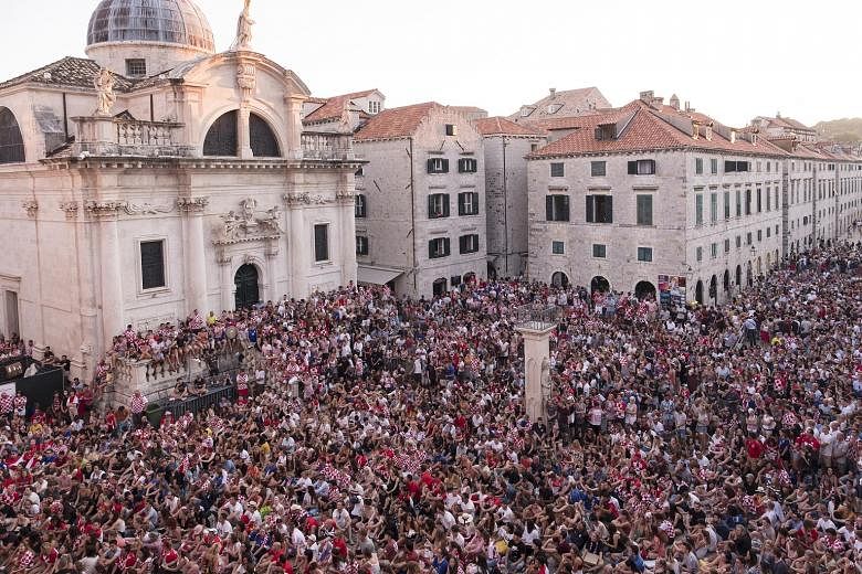 Fans packing Stradun Square in the old quarter of Dubrovnik to watch Croatia's World Cup semifinal with England on Wednesday.