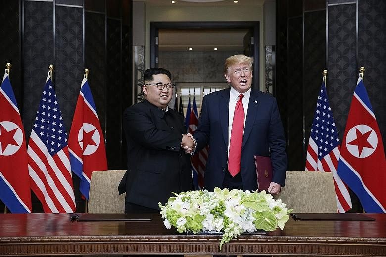 US President Donald Trump and North Korean leader Kim Jong Un at the historic US-North Korea summit in Singapore on June 12. According to a letter released on Thursday, Mr Kim expressed hope for "practical actions" in the future, but made no mention 