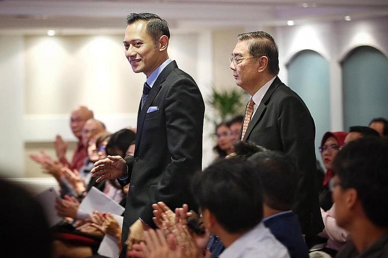 Mr Agus Harimurti Yudhoyono with S. Rajaratnam School of International Studies executive deputy chairman Ong Keng Yong ahead of delivering his lecture yesterday. The 39-year-old son of Indonesia's former president Susilo Bambang Yudhoyono is tipped a