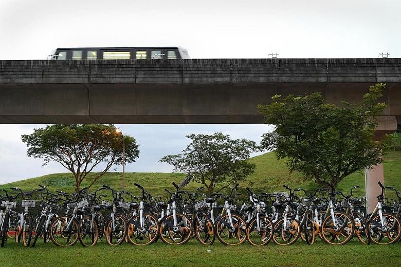 Rows of oBikes at a field in Sengkang. The bicycle-sharing firm has exited the Singapore market, saying it is unable to meet new licensing requirements. The writer believes that given the potential advantages of the bike-sharing industry, regulators 
