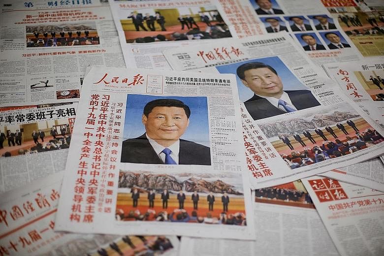 The front page of the Communist Party's flagship newspaper the People's Daily and other newspapers. A Financial Times investigation found that party-affiliated outlets were reprinting or broadcasting their content in at least 200 nominally independen
