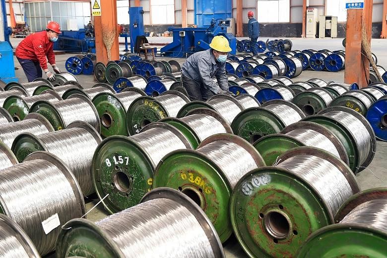 Rolls of aluminium at a factory in Zouping in China's eastern Shandong province. Earlier this year, the US levied tariffs on steel and aluminium from China and elsewhere. With both countries appearing willing to re-enter into trade talks, attention w