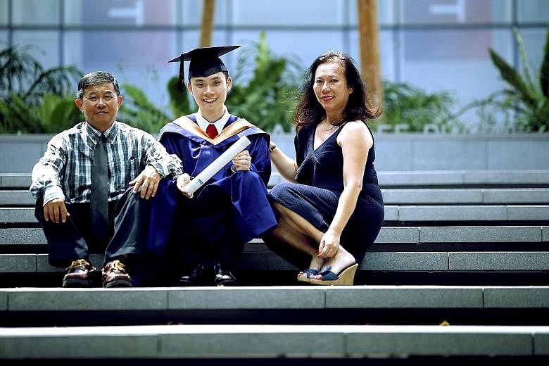 Mr Nicholas Ooi (seated) and NUS mates (from left) Janelle Lee, Han Lynn and Joshua Foong started social enterprise Bantu, which uses technology to manage volunteers in the social service sector. Mr Nicholas Ooi, who earned an honours degree in compu
