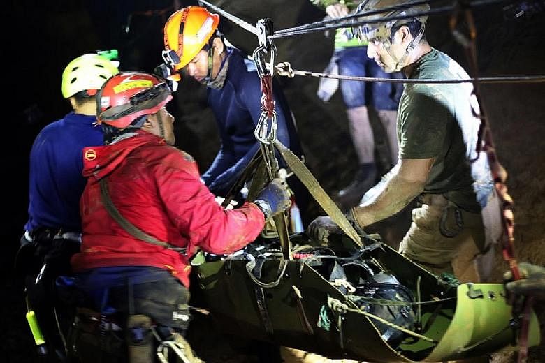 Rescuers evacuating one of the soccer team members from Tham Luang cave in Chiang Rai province, Thailand, last week.