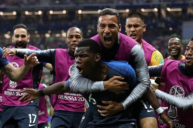 Pure delirium for France as they celebrate midfielder Paul Pogba's (No. 6) stunning goal which stretched their lead to 3-1 against Croatia in the World Cup final at the Luzhniki Stadium in Moscow.