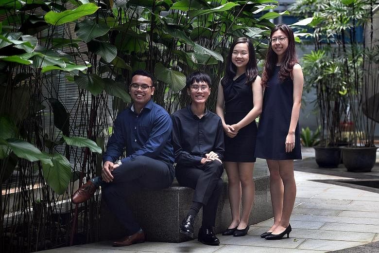 SPH scholarships for undergraduate studies were awarded to (from left): Mr Aqil Hamzah, Mr Chua Wei Qian, Ms Zhang Qianxue and Ms Crystal Heng. Two will be heading to NTU and two to NUS.
