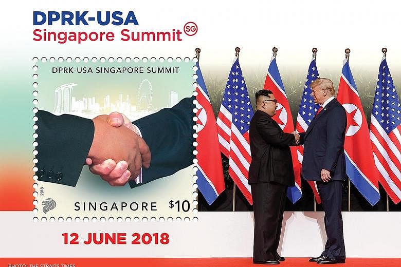 The collector's sheet, which will be launched on Friday, features a photo of the handshake between North Korean leader Kim Jong Un and US President Donald Trump taken by Straits Times photojournalist Kevin Lim in Capella Singapore's courtyard.