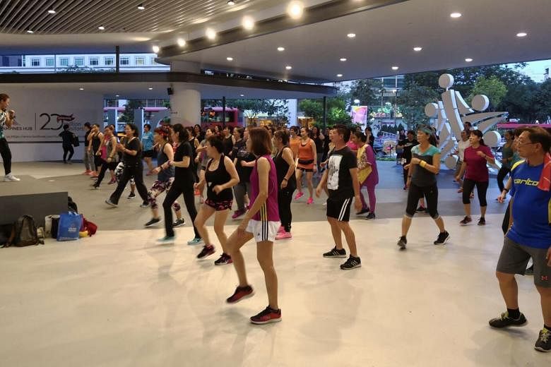 A Megadanz session being led by fitness instructor Heidi Lim at Gate 1 of Our Tampines Hub. This session, co-organised by People’s Association, Our Tampines Hub and Alpha Fitness, takes place every Friday from 7pm to 8pm and is free. 