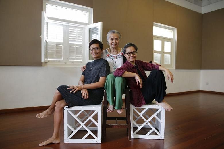 The Theatre Practice’s artistic director Kuo Jian Hong (far left), with her sister Okorn-Kuo Jing Hong (left) and their mother, Goh Lay Kuan. 