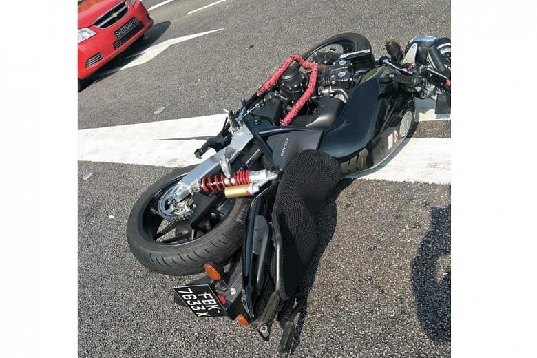 Motorcycle crashes into car on BKE before Woodlands Checkpoint exit ...