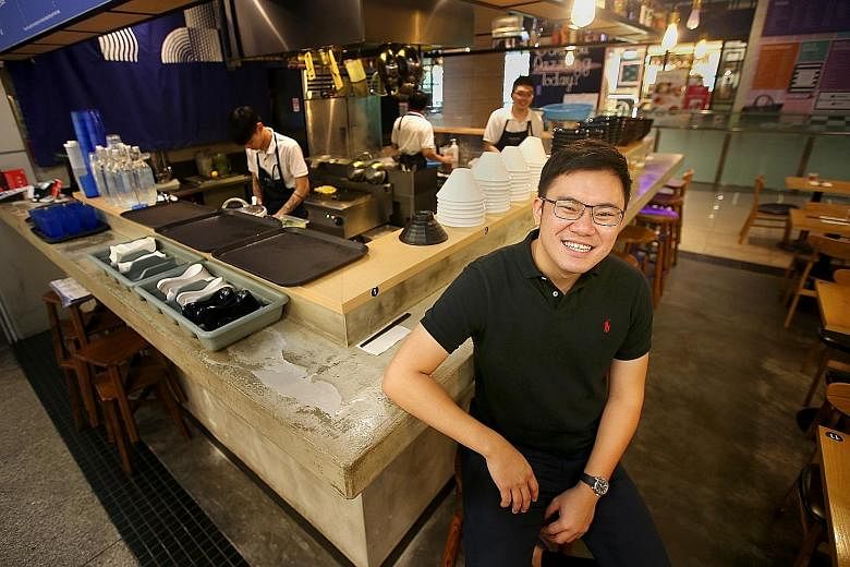 Mr Melvin Ang at Kanshoku Ramen at Orchard Gateway, the ramen chain that he runs. The 29-year-old has found success in the food and beverage business in spite of his difficult growing-up years - his father was a gambler who owed loan sharks hundreds 