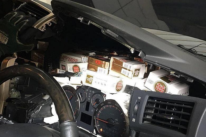 ICA officers found the duty-unpaid cigarettes in various places in the Malaysia-registered car, such as inside the modified dashboard.