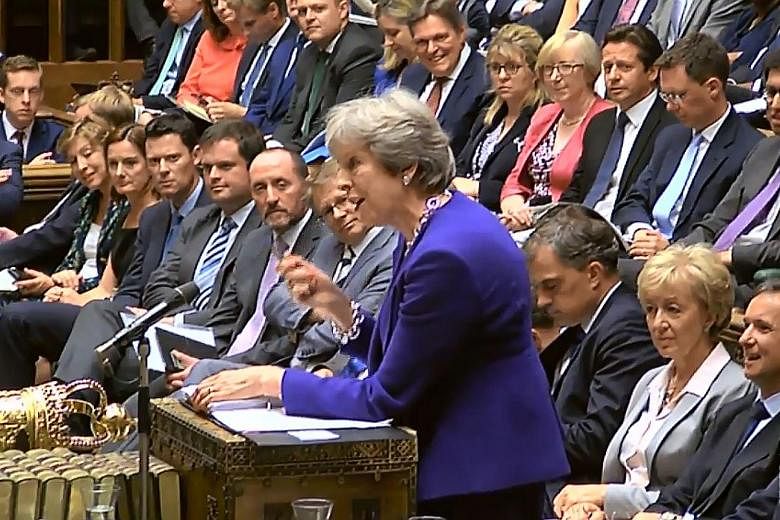 British Prime Minister Theresa May standing her ground in Parliament yesterday, signalling that she would not drop her proposal for Britain's future relationship with the bloc.