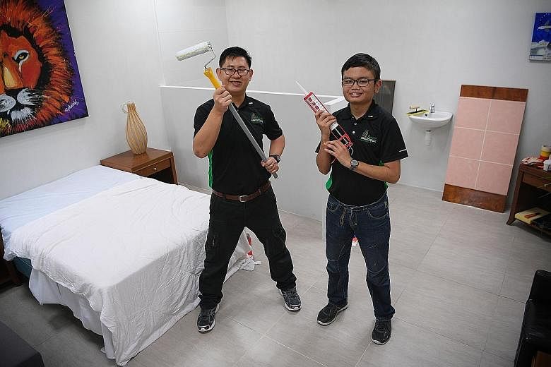 Mr Ng Yi Feng (left) and Mr Muhaimin Afandi, students of the new Building and Facilities Services Programme, in a mock-up of a hotel room in the APSN Centre for Adults. The nine-month course starts with vocational training and includes a six-month ap