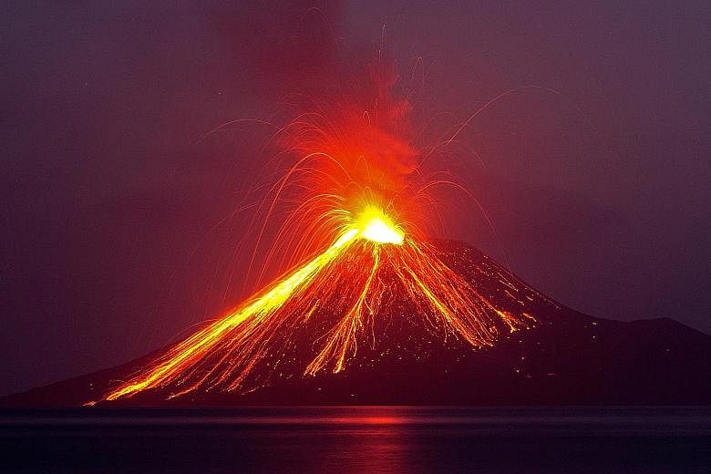 The "child" of the legendary Indonesian volcano Krakatau erupted on Thursday, spewing a plume of ash high into the sky as molten lava streamed down from its summit. Anak Krakatau - a small volcanic island that emerged from the ocean a half century af