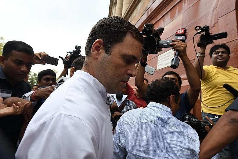 Congress party president Rahul Gandhi arriving for the Indian Parliament session yesterday during which Prime Minister Narendra Modi faced a no-confidence motion. Ties between the opposition and the ruling BJP have been acrimonious and at their worst