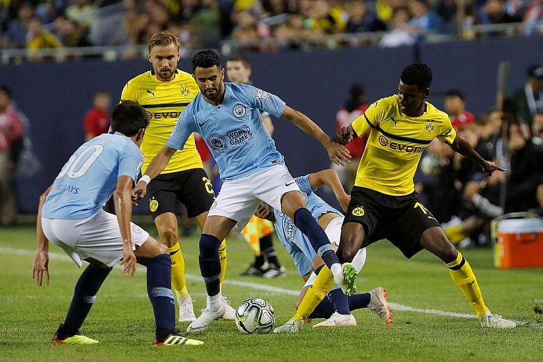 Club-record signing Riyad Mahrez made his debut for Manchester City in the International Champions Cup match against German side Borussia Dortmund at the Soldier Field Stadium in Chicago on Friday. The Algerian came close to scoring with a 20-yard fr