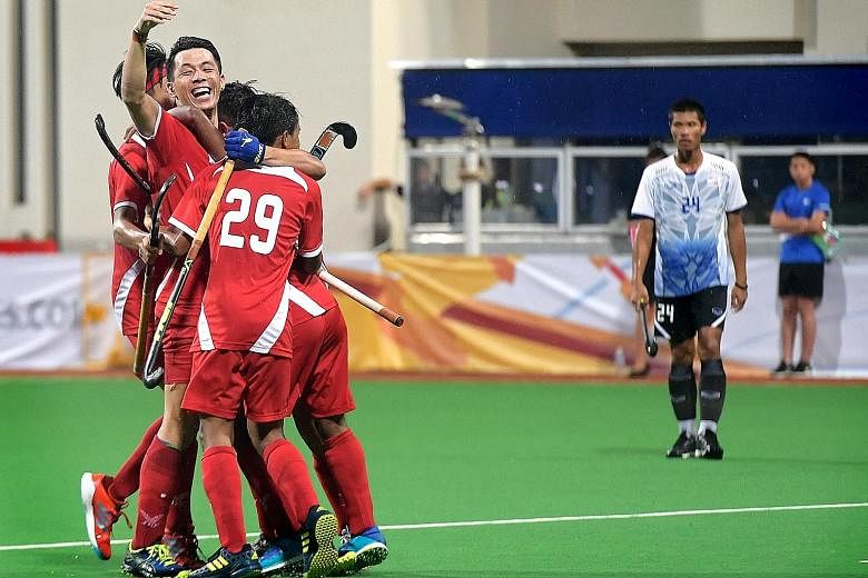 Left: The national men's hockey team celebrating their win at the Hockey Series Open earlier this month. From top: Only swimmers Joseph Schooling and Quah Zheng Wen, and sailor Maximilian Soh were granted long-term deferments over the last 15 years. 