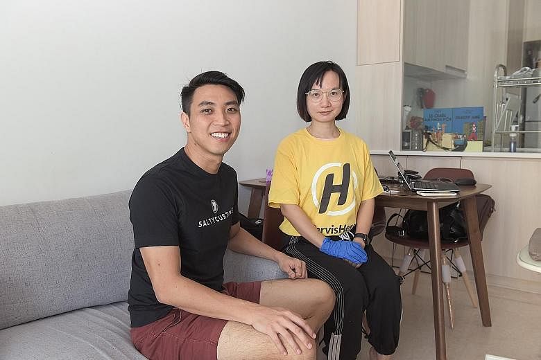 Left: Domestic cleaner Bryan Ang cleaning a toilet. More people are using online platforms to look for cleaners to tidy up their homes. Far left: Mr Justin Khoo hires part-time help from ServisHero, where Mrs Candy Wei, 33, is a supervisor.