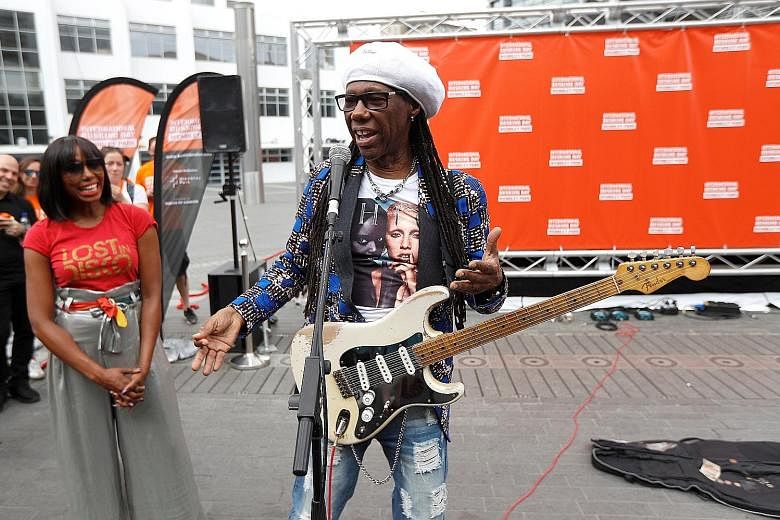 Nile Rodgers, the guitarist and founding member of disco band Chic, got back to his busking roots in London last Saturday, delighting fans with stripped-down versions of some of his best-known songs. Wearing a white beret, the 65-year-old said playin