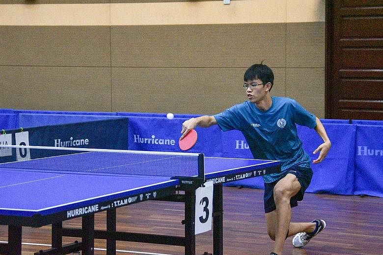 Josh Chua returning a backhand during his 11-9, 11-5, 8-11, 11-6 win over Thailand's Supakron Pankhaoyoy in the final match of the Asean Schools Games boys' table tennis team final in Klang. Both the paddlers and the girls' artistic gymnastics team r