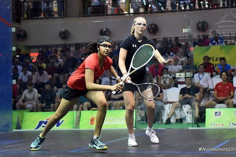 Singapore squash player Sneha Sivakumar reaching for a backhand return in her loss to English third seed Lucy Turmel in the quarter-finals of the tournament in Chennai.