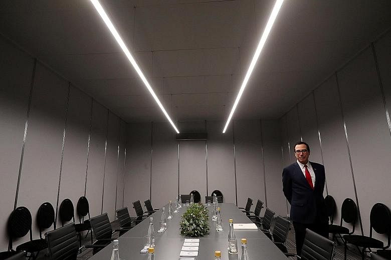 United States Secretary of the Treasury Steven Mnuchin cut a lone figure as he waited for a meeting with France's Finance Minister Bruno Le Maire at the Group of 20 (G-20) summit in Buenos Aires, Argentina, last Saturday. The International Monetary F
