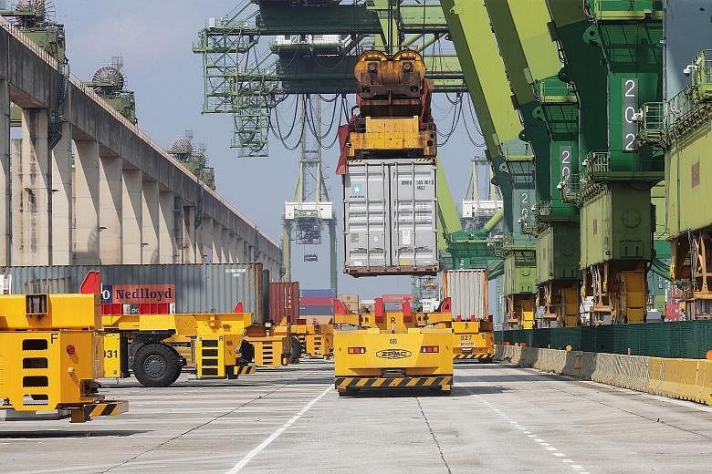 The automated quay crane system at the Pasir Panjang Terminal will be used alongside automated guided vehicles. Under the system, part of the process of moving containers can be done automatically.