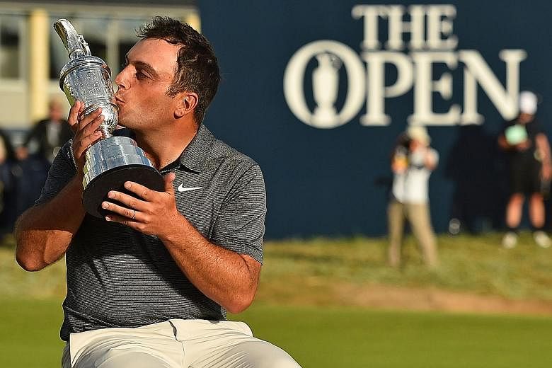 Francesco Molinari of Italy kisses the Claret Jug at Carnoustie, Scotland on Sunday, after winning The Open by two strokes. When asked how he would celebrate, he confessed that he would probably have to cancel his budget flight back to London.