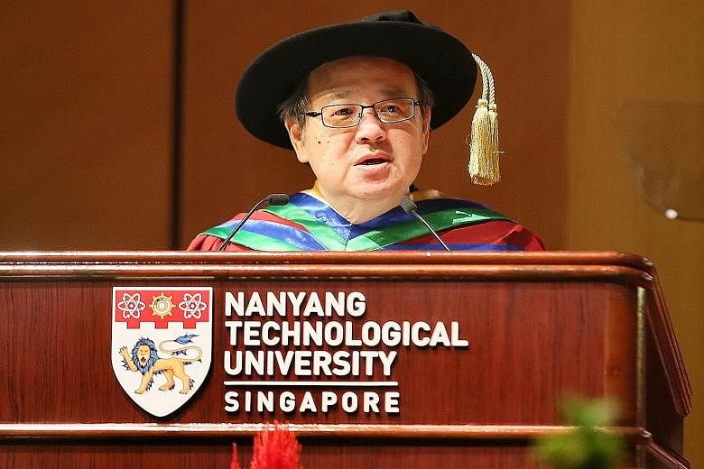 Dr Tony Tan Keng Yam receiving the honorary degree from President Halimah Yacob at Nanyang Technological University yesterday. Former head of civil service Peter Ho was awarded an honorary Doctor of Science. Lee Foundation chairman Lee Seng Tee recei