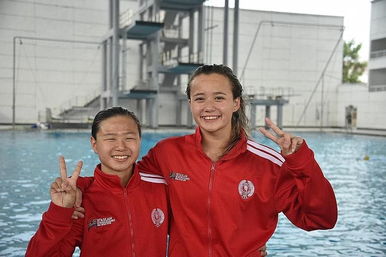 Best friends Elena Pedersen (right) and Claresa Liau, both from Methodist Girls' School, won gold in the 100m backstroke and 200m breaststroke respectively at the Asean Schools Games in Malaysia yesterday.