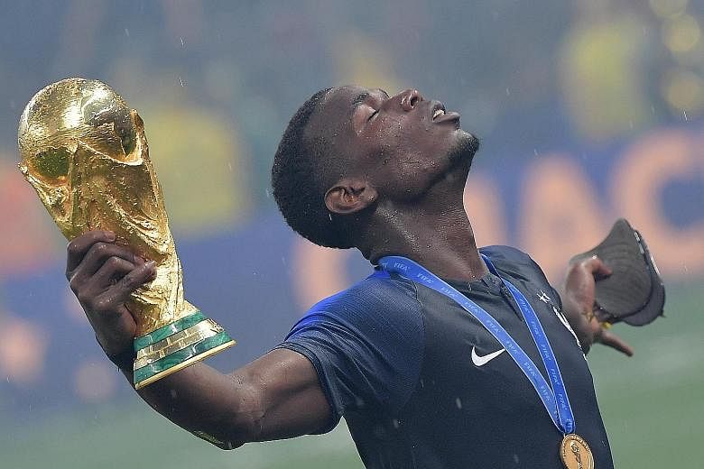 Paul Pogba celebrating after France's win in the World Cup final. United boss Jose Mourinho wants him to continue that form for his club.