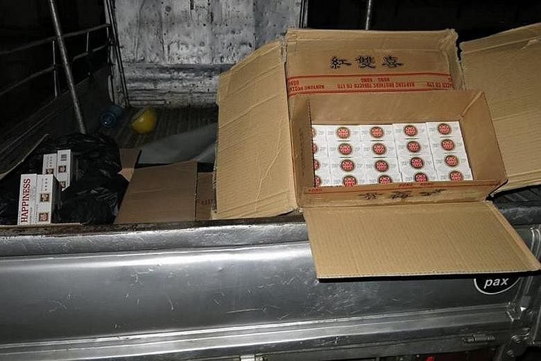 The authorities arrested two men and seized more than 1,600 cartons of contraband cigarettes in an operation last Wednesday.