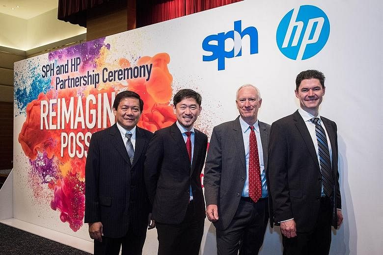 (From left) SPH senior vice-president of production Lim Swee Yeow, SPH deputy CEO Anthony Tan, HP president of Asia Pacific and Japan Richard Bailey, and vice-president Michael Boyle at yesterday's event.