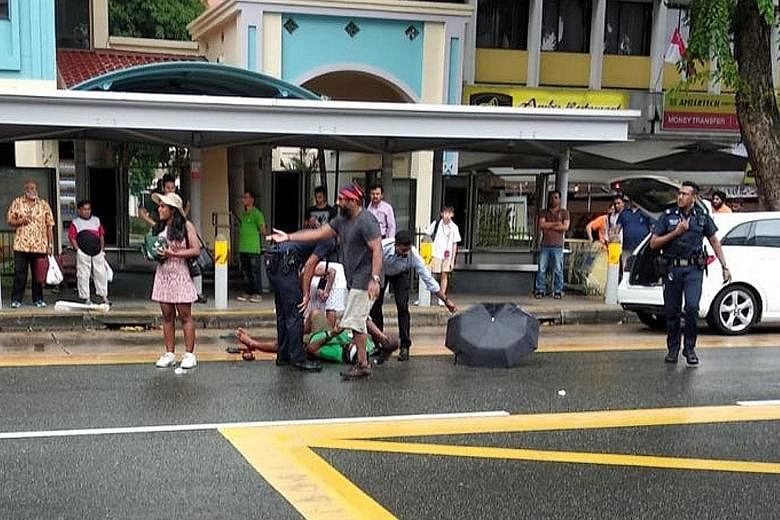 A picture circulating on social media which appears to show the victim lying on Serangoon Road in front of a bus stop yesterday afternoon. The man, believed to be a Singaporean, was taken to Tan Tock Seng Hospital with injuries on the back of his hea