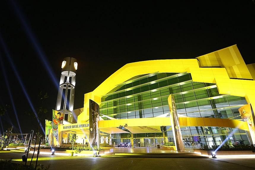 DC Comics characters on stage during the official opening of the Warner Bros World theme park on Yas Island in Abu Dhabi. The complex (above left), which opened to the public on Wednesday, boasts 29 rides and six themed areas - including the fictiona