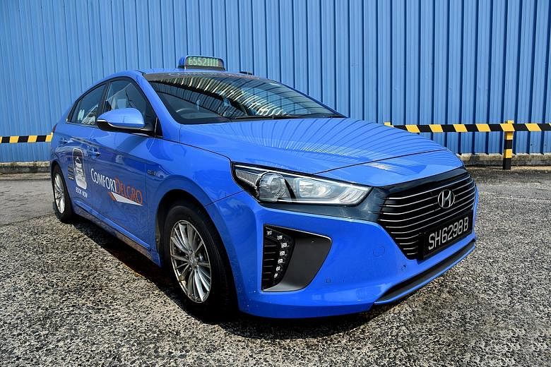 ComfortDelGro's new Hyundai Ioniq Hybrid taxi. Last week, the dominant taxi operator put two fully electric Hyundai cabs on the road.