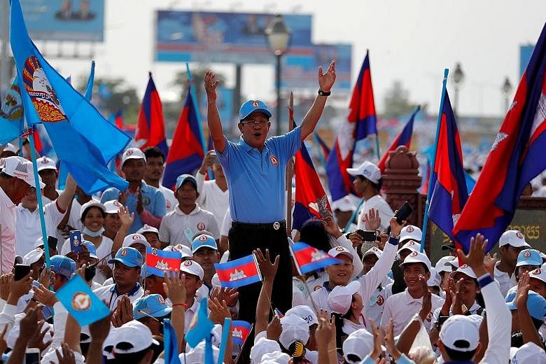 Cambodian Prime Minister Hun Sen at a rally on the final day of campaigning yesterday in Phnom Penh. Mr Hun Sen, who has been premier for over three decades, looks set to win another term in tomorrow's election.