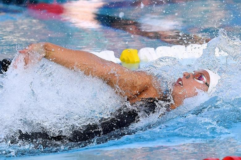 Kathleen Baker on her way to victory in a world-record 58.00sec in the 100m backstroke at the US swimming championships on Saturday. She said she was "on cloud nine" after lowering the time of 58.10 set by Canada's Kylie Masse at last year's World Ch