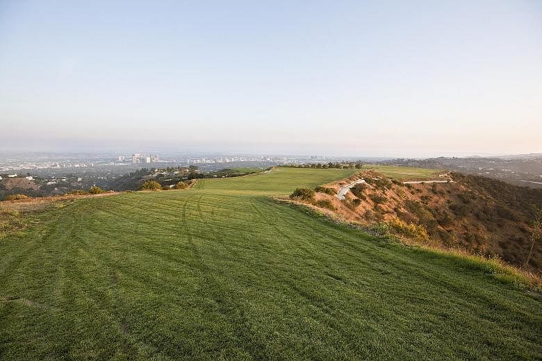 The site is the highest point in the prized 90210 zip code. It occupies a ridge in the Beverly Crest neighbourhood, adjacent to Beverly Hills, with Studio City to the north and Bel Air to the west. Previous owners include Princess Shams Pahlavi and m