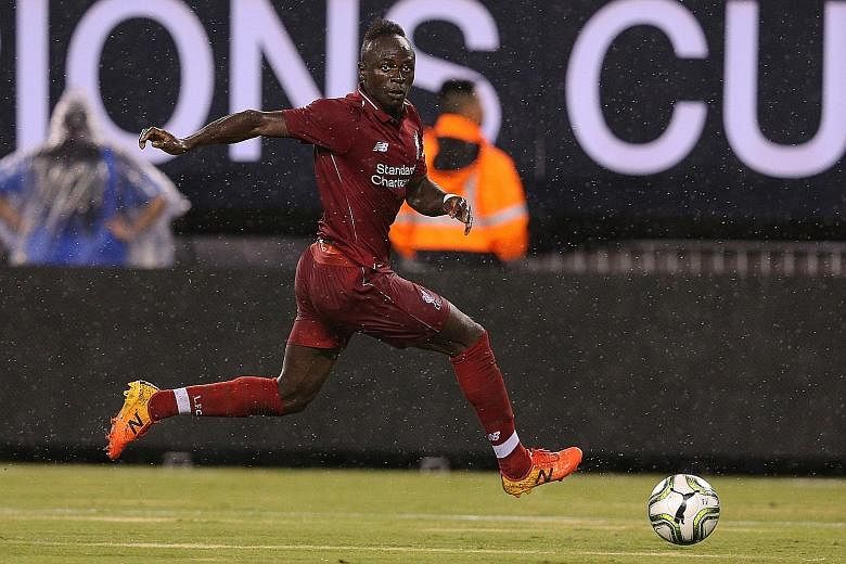 Liverpool's Sadio Mane in action against Manchester City during their ICC match last week. The winger still has three years remaining on his contract, but manager Jurgen Klopp is keen for him to follow Mohamed Salah and Roberto Firmino and finalise a