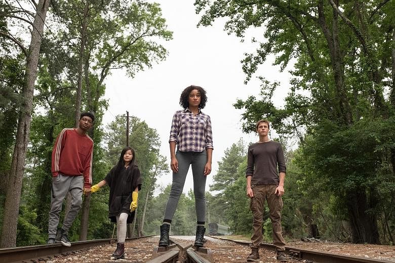 Director Jennifer Yuh Nelson, who says she always had someone take a chance on her, hired ethnically diverse actors to lead The Darkest Minds (above).