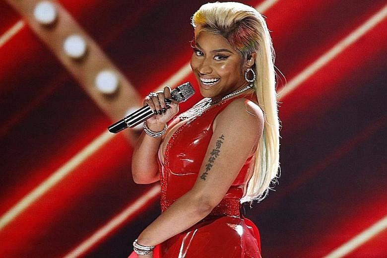 Nicki Minaj's upcoming album has a track that contains a Tracy Chapman sample, prompting her to seek clearance so that she can roll out the album this month.
