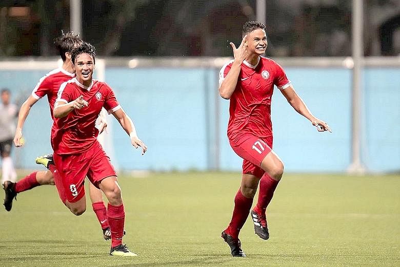 Brothers Irfan (No. 17) and Ikhsan Fandi celebrate Irfan's winning goal in the Young Lions' 2-1 victory over Tampines Rovers on Wednesday. The duo are heading to Portugal for trials with Primeira Liga side Sporting Braga.