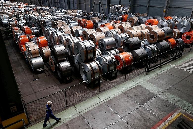 Metal coils seen at a Belgium steel plant. So far, the direct effects of US President Donald Trump's steel and aluminium tariffs are limited, says Mr Johannes Bahrke, a spokesman for the European Commission. But Mr Bahrke says that "trade protectioni