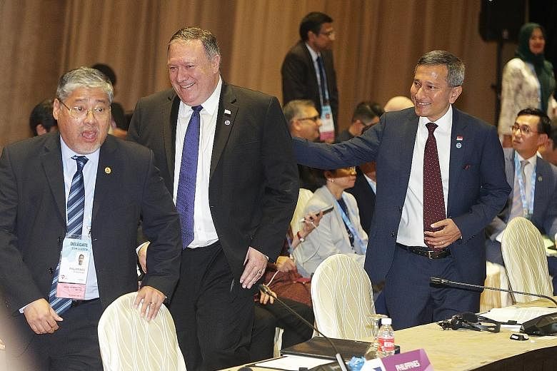 From right: Foreign Minister Vivian Balakrishnan, US Secretary of State Mike Pompeo and Philippine Foreign Affairs Undersecretary Enrique Manalo at the Asean-US Ministerial Meeting yesterday. Mr Pompeo underlined his country's continued commitment to