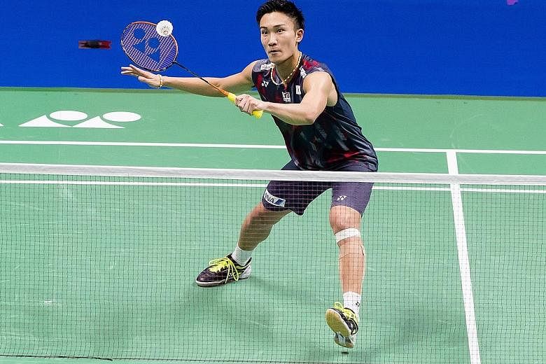A triumphant Shi Yuqi of China celebrates after defeating compatriot Chen Long in their semi-final at the World Championships in Nanjing yesterday. Shi will meet Japanese Kento Momota (above), who defeated unseeded Malaysian Daren Liew, in today's final.