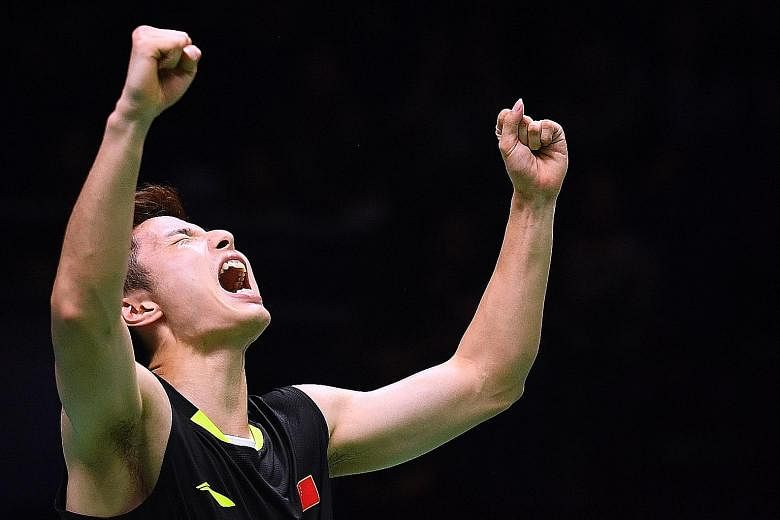 A triumphant Shi Yuqi of China celebrates after defeating compatriot Chen Long in their semi-final at the World Championships in Nanjing yesterday. Shi will meet Japanese Kento Momota, who defeated unseeded Malaysian Daren Liew, in today's final.