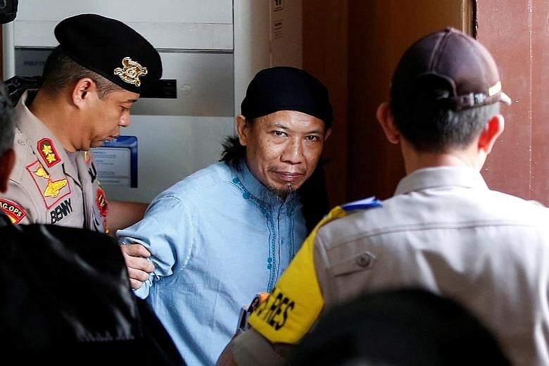 As the ranking JAD member in custody, leader Zainal Anshori was in court to answer charges.