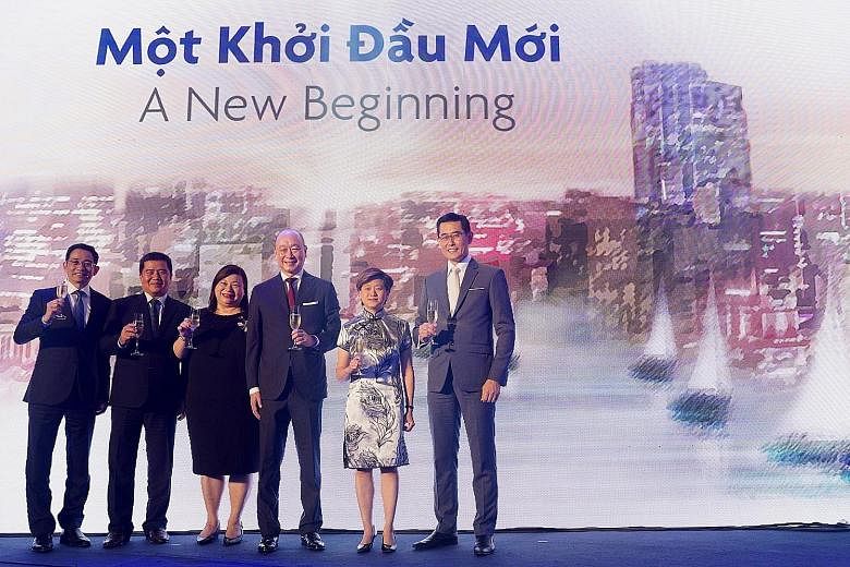 (From left) Mr Victor Ngo, chairman of UOB Vietnam; Mr To Duy Lam, director, Ho Chi Minh City branch, State Bank of Vietnam; Ms Leow Siu Lin, Singapore's Consul-General in Ho Chi Minh City; Mr Wee Ee Cheong, UOB's deputy chairman and chief executive 